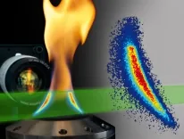 Et kamera fanger opp en flamme og dens varmefordeling, som visualiseres i et fargekart ved siden av.